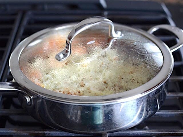 Lid on skillet to melt the mozzarella