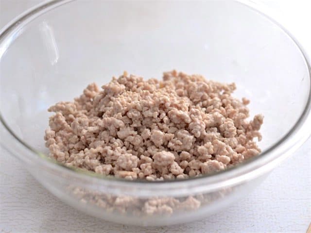 Cooked Ground Pork in a glass bowl