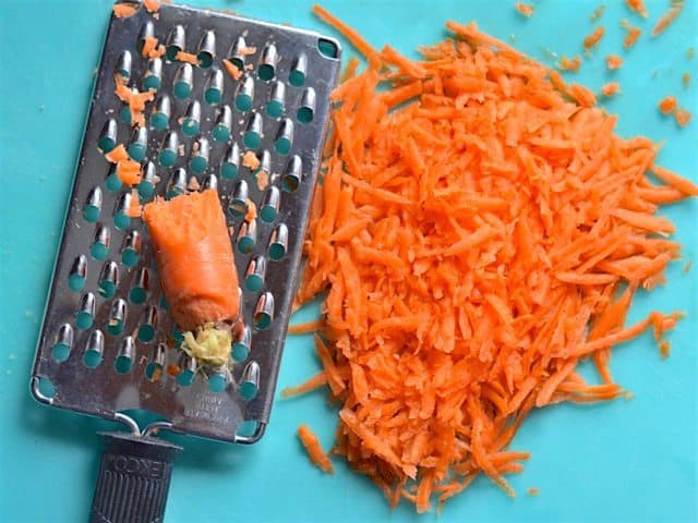 Grated Carrot on a large-holed cheese grater