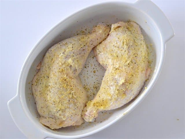 Chicken smeared with butter and coated in lemon pepper seasoning