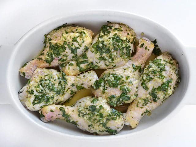 Drumsticks in a baking dish, ready to bake