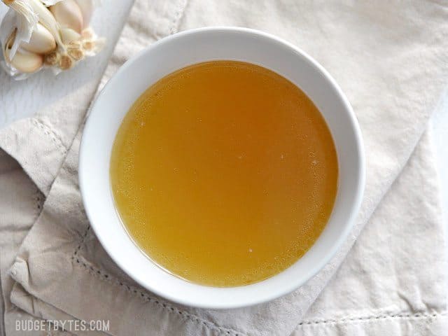 Overhead view of a bowl full of finished Instant Pot Chicken Stock