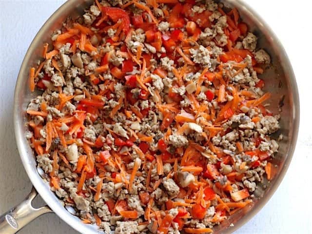 Carrots and Bell Pepper added to the skillet