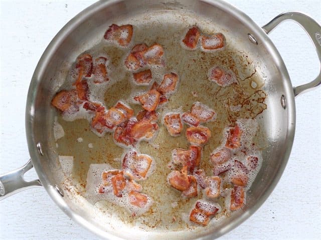 Bacon browned in a skillet