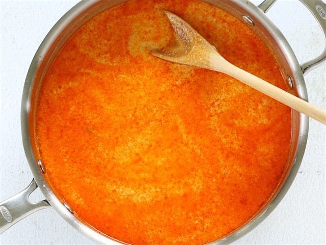 Chicken Broth, Coconut Milk, and Fish Sauce added to the skillet