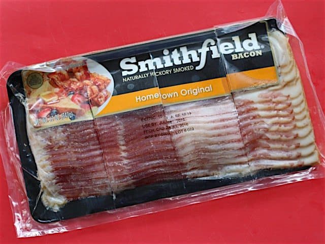 A package of bacon cut into 3 oz. portions