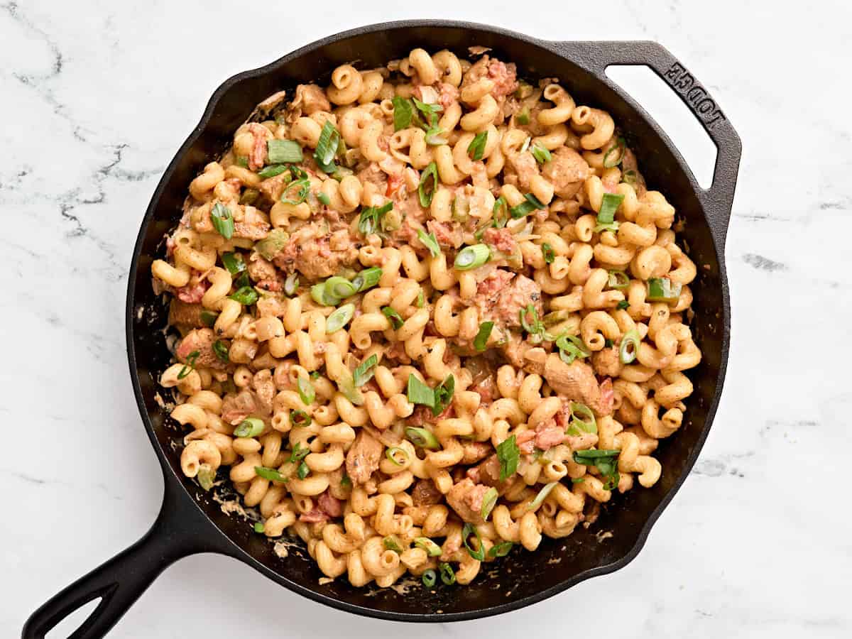 Finished creamy chicken fajita pasta in a skillet.