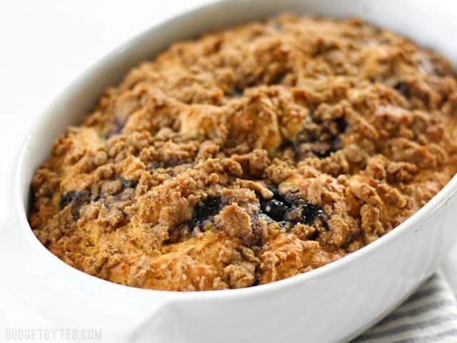 View of the top of a Blueberry Buttermilk Coffee Cake in a casserole dish