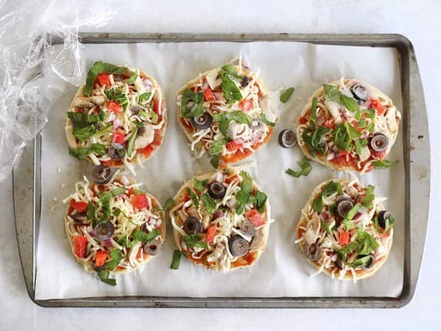 Frozen English Muffin Pizzas, ready to be transferred to a freezer bag