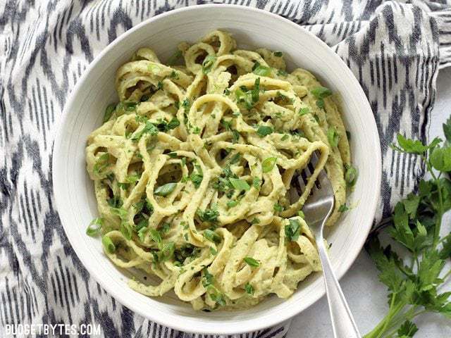 Parsley scallion hummus pasta served in a bowl.