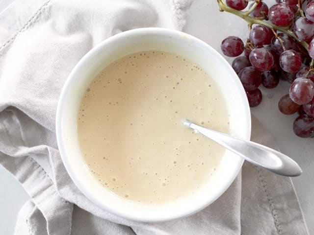 Top view of a bowl of Creamy Dijon Dressing