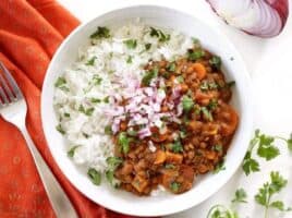 Slow Cooker Coconut Curry Lentils are a hands-off, fiber filled, freezer friendly vegan dinner. Budgetbytes.com