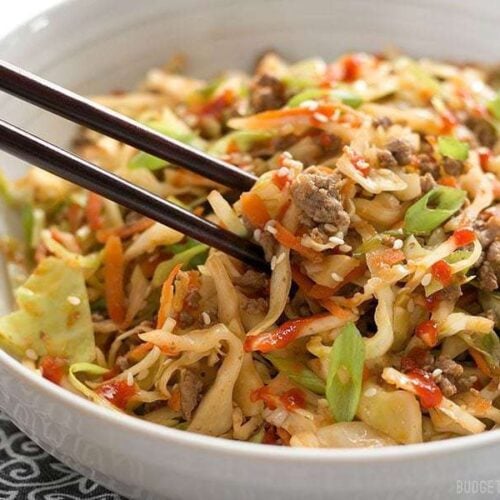 Beef and cabbage stir-fry served in a bowl.