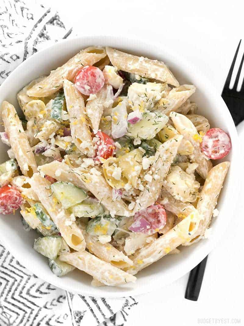 Overhead view of a bowl full of Creamy Lemon Dill Greek Pasta Salad