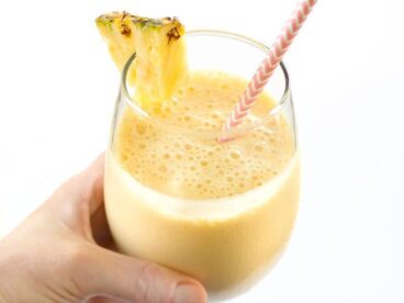 When you need a tropical escape this homemade Pineapple Orange Julius is the perfect sweet and creamy frozen drink to take you away. BudgetBytes.com