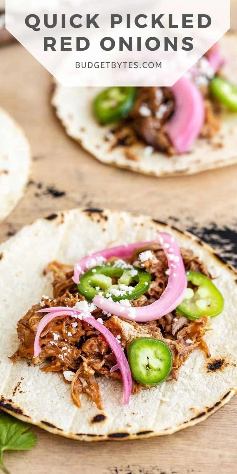 Side view of tacos topped with pickled red onions, title text at the top