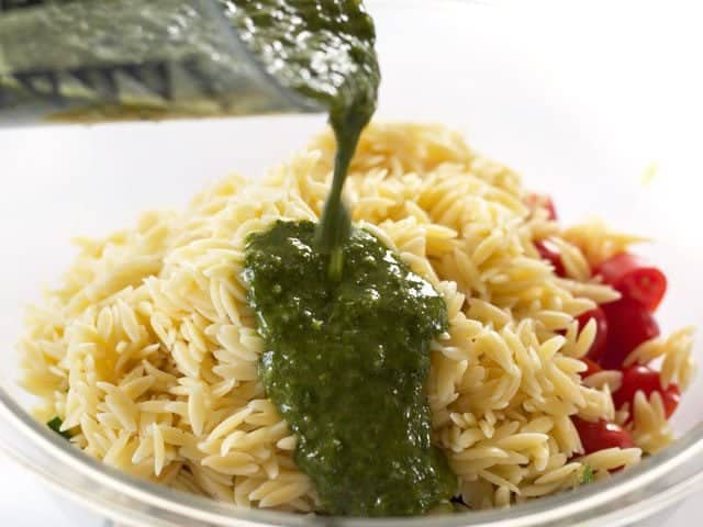 Add cooked orzo and chimichurri to the bowl with the zucchini and tomatoes