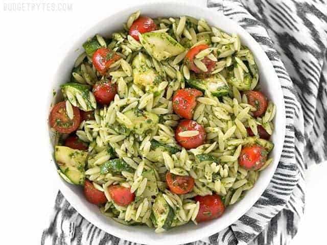 Zucchini and orzo salad with chimichurri in a bowl.