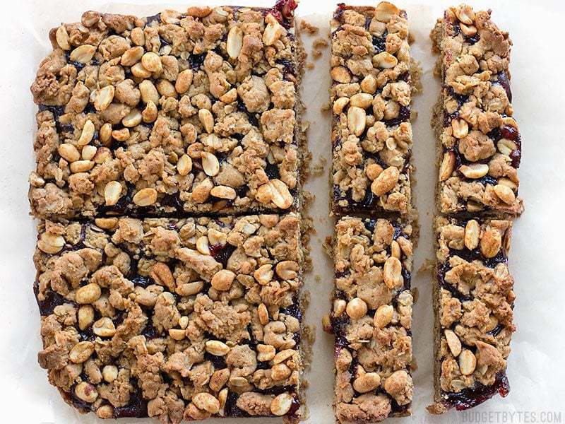 Peanut Butter and Jelly Bars being cut into batons