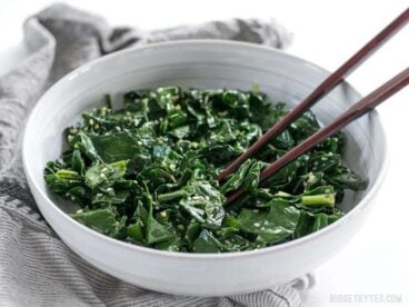 Sesame Kale is a quick and easy side dish that pairs perfectly with any Asian inspired meal. BudgetBytes.com