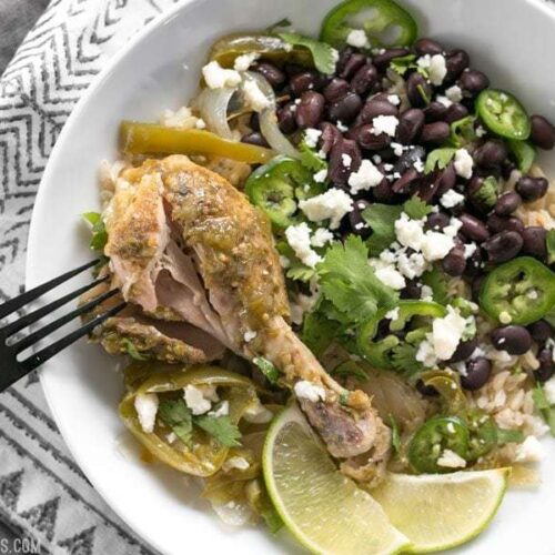 Salsa verde chicken bowl served with a fork.