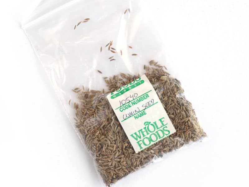 Cumin Seeds from bulk bins in a small plastic bag