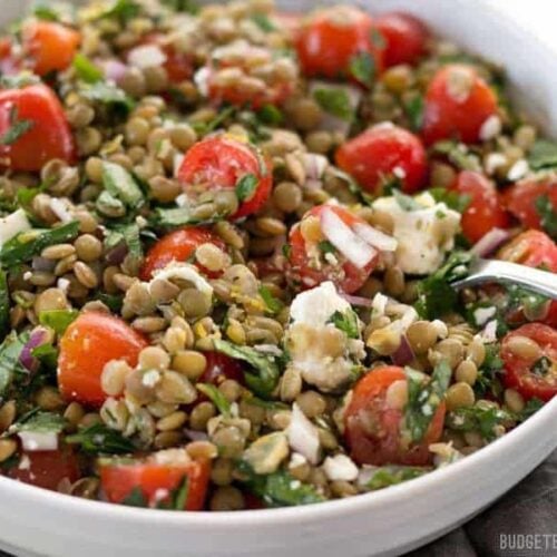 Close-up of marinated lentil salad in a bowl.