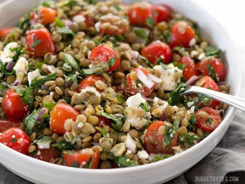 Close-up of marinated lentil salad in a bowl.