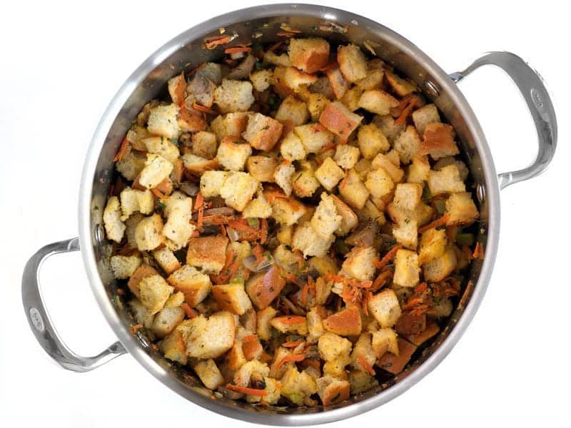 Add Bread Cubes to the pot with the vegetables and walnuts