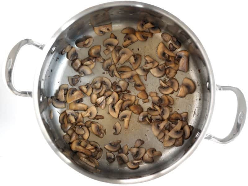 Browned Mushrooms in a large soup pot