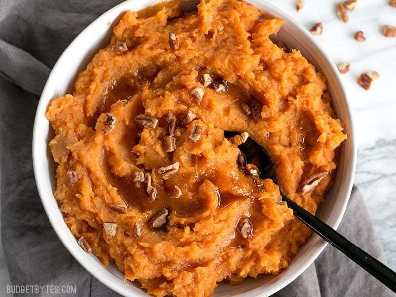 Maple brown butter mashed sweet potatoes in a bowl.