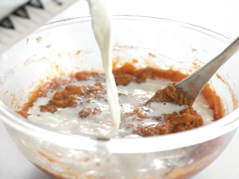 Add milk to sweet potato mixture