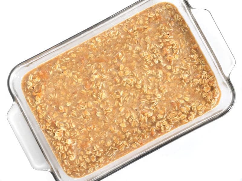 Sweet Potato Casserole ready to bake in a glass casserole dish