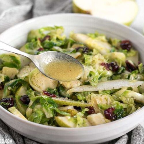 Warm Brussels sprouts and pear salad in a bowl.