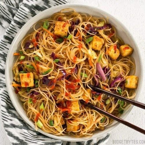 Singapore noodles with crispy tofu and sriracha.