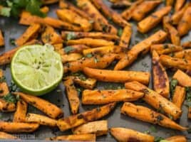 Bright lime juice and earthy cumin pair perfectly with the subtle creamy sweetness of sweet potatoes in these Cumin Lime Roasted Sweet Potatoes. BudgetBytes.com