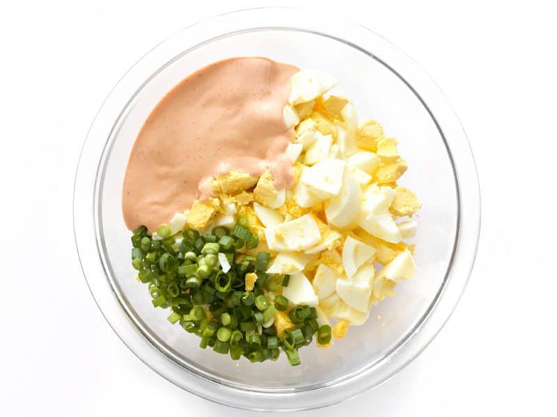 Combine Eggs Onion and Salad Dressing in a bowl