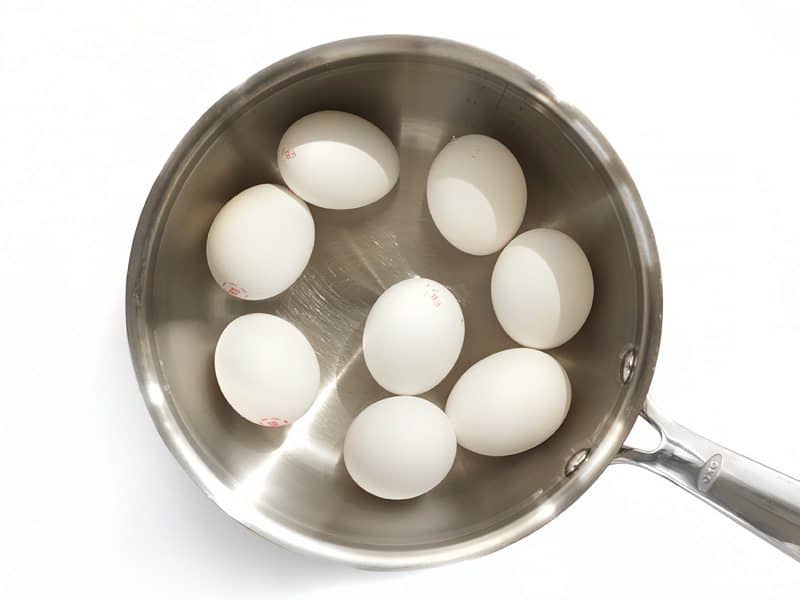 Eggs in Pot ready to be boiled