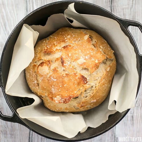 Baked no-knead dough in a cast iron Dutch oven with parchment.