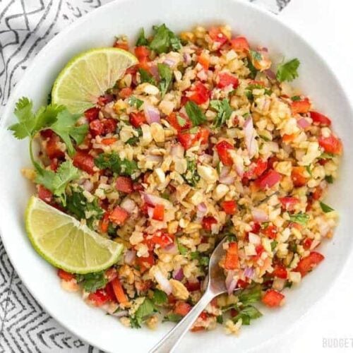 Riced cauliflower makes a filling low-carb base for this fresh and vibrant Thai-inspired Peanut Lime Cauliflower Salad. BudgetBytes.com