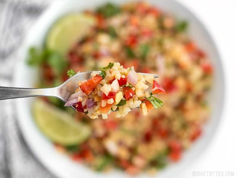 Close up of a forkful of Peanut Lime Cauliflower Salad