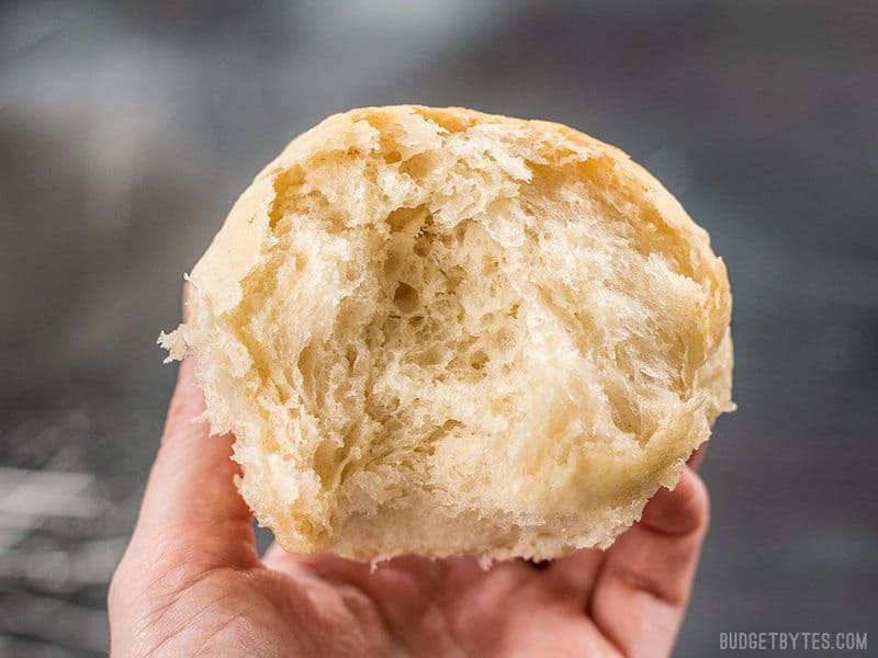 Close up of one Buttermilk Pull-Apart Rolls broken in half