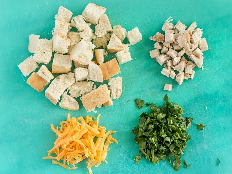 Savory Breakfast Mug Dry Ingredients - Cubed bread, cubed chicken, cheddar, and parsley