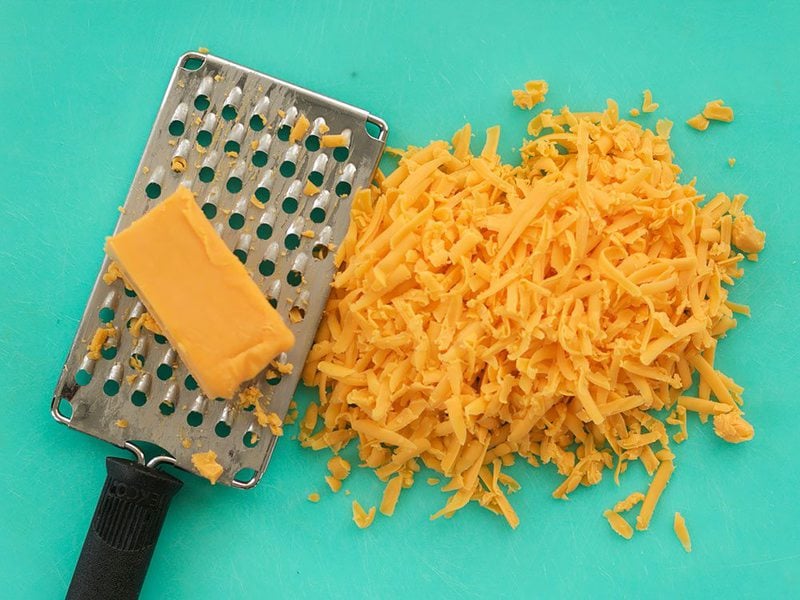 Shredded Cheddar with cheese grater