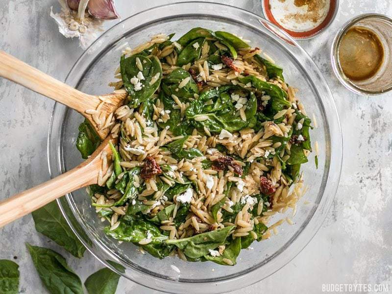 A quick homemade balsamic vinaigrette makes this simple Spinach and Orzo Salad extra special. Serve as a light lunch or a side with dinner. BudgetBytes.com