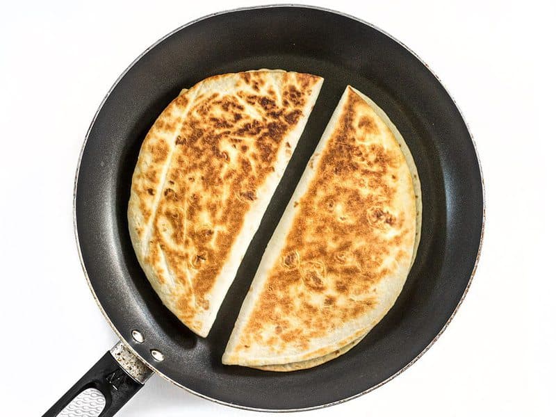 Roasted Corn Quesadillas being toasted in a skillet