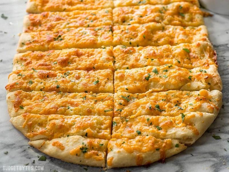 Front view of sliced Cheesy Garlic Bread 