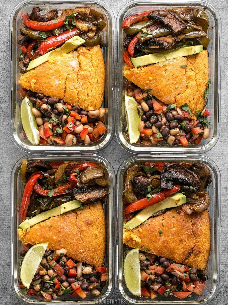 Four glass smoky chipotle portobello fajita meal prep containers side by side