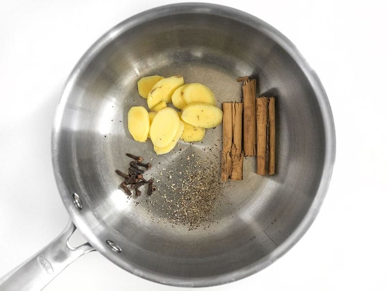 Ginger Cinnamon Pepper Cloves in the sauce pot