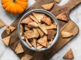 These Cinnamon Pita Crisps are a tasty little snack that's perfect for fall. Dip them into your favorite sweet treat or eat them on their own. BudgetBytes.com